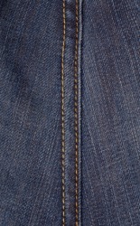 A seam on a piece of denim. A seam on a piece of denim.