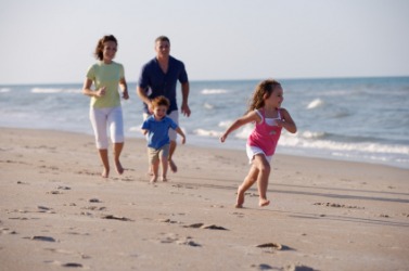 A family enjoying the seashore. A family enjoying the seashore.