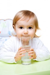This baby is drinking wa-wa. This baby is drinking wa-wa.