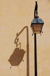 The streetlights shadow is an example of umbra. The streetlights shadow is an example of umbra.