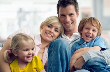 A man with his immediate family. A man with his immediate family.