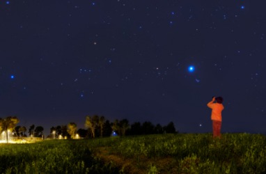 A child beholds a brilliant star. A child beholds a brilliant star.