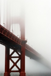Fog surrounds the Golden Gate bridge in San Francisco. Fog surrounds the Golden Gate bridge in San Francisco.