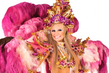 A carnival dancer wearing an ornate costume. A carnival dancer wearing an ornate costume.