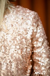 Detail of a sequined jacket. Detail of a sequined jacket.