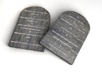 The Ten Commandments on stone tablets. The Ten Commandments on stone tablets.