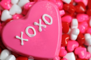 XO stands for hugs and kisses. XO stands for hugs and kisses.