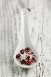 Salt and pepper have been combined in this spoon. Salt and pepper have been combined in this spoon.