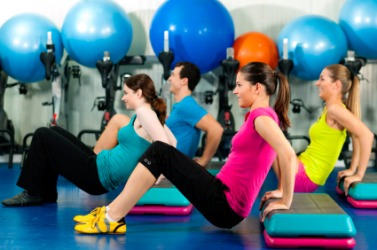 A group of exercisers. A group of exercisers.