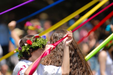 Maypole dancing is an example of maying. Maypole dancing is an example of maying.
