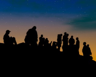 People looking at the stars overhead. People looking at the stars overhead.