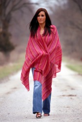 A woman wearing a red shawl. A woman wearing a red shawl.