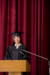 The valedictorian speaks at her graduation. The valedictorian speaks at her graduation.