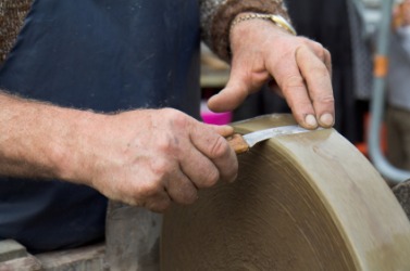 Whetting a knife. Whetting a knife.
