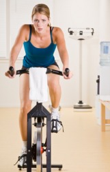 A woman engaged in aerobic activity. A woman engaged in aerobic activity.