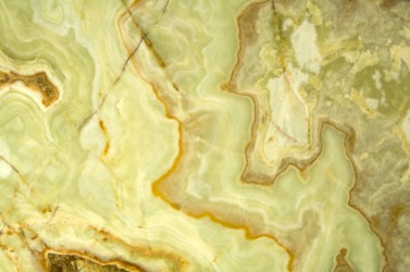 A piece of light green onyx. A piece of light green onyx.