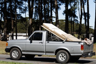 Boards loaded onto a pickup truck. Boards loaded onto a pickup truck.