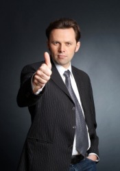 A thumbs-up is one way to give an accolade. A thumbs-up is one way to give an accolade.