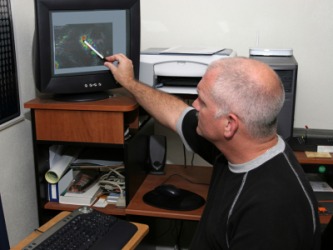 A meteorologist tries to forecast the path of a storm. A meteorologist tries to forecast the path of a storm.