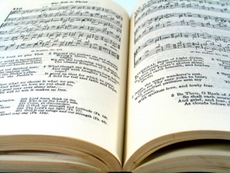 An open book of hymns. An open book of hymns.