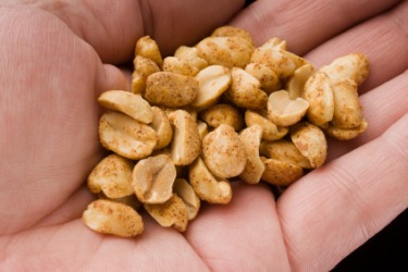 A handful of peanuts. A handful of peanuts.