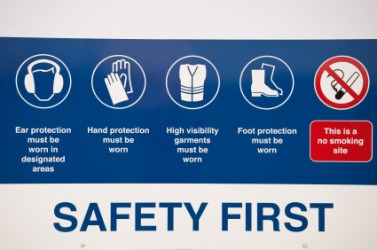 A sign promoting industrial safety. A sign promoting industrial safety.