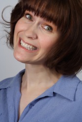 A woman with a fakey smile. A woman with a fakey smile.