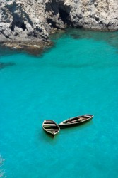 Two small boats adrift. Two small boats adrift.