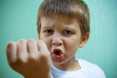 A belligerent little boy. A belligerent little boy.