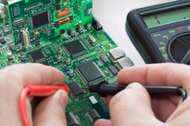 An electronics circuit board. An electronics circuit board.
