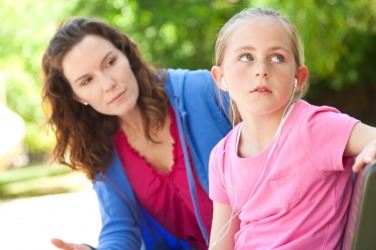 This child is acting aloof. This child is acting aloof.