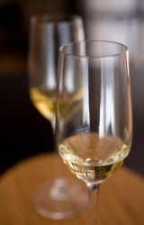 A glass of Moscato. A glass of Moscato.