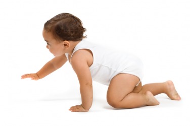 A baby crawls. A baby crawls.