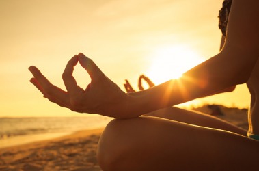 Meditating on the beach creates peace of mind. Meditating on the beach creates peace of mind.