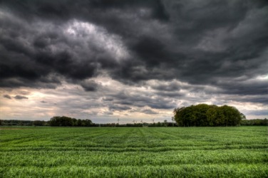 The ominous clouds portend a heavy storm. The ominous clouds portend a heavy storm.