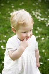 A little girl with blond hair. A blonde. A little girl with blond hair. A blonde.