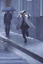 He would preferably be protected from the rain with an umbrella rather than a newspaper. He would preferably be protected from the rain with an umbrella rather than a newspaper.