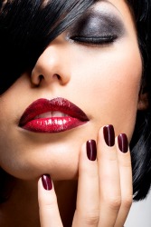 The model has pronounced make-up. The model has pronounced make-up.