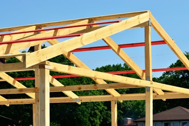 The purlins (highlighted in red) support the rafters in roof construction. The purlins (highlighted in red) support the rafters in roof construction.