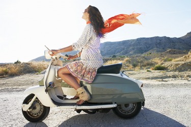 She put-putted through the countryside on her scooter. She put-putted through the countryside on her scooter.