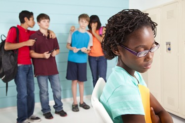 The group showed racist behavior by excluding the only student who looked different. The group showed racist behavior by excluding the only student who looked different.