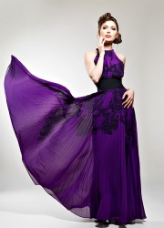 The ravishing model wore a purple gown. The ravishing model wore a purple gown.