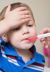 Caleb's mom gave him liquid medicine with the hope of remediating his fever. Caleb's mom gave him liquid medicine with the hope of remediating his fever.