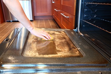 The oven looked brand new after she removed the grimy buildup on the inside of the glass door. The oven looked brand new after she removed the grimy buildup on the inside of the glass door.