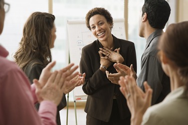 Cynthia's usual reticence at the office melted away when everyone congratulated her on her recent promotion. Cynthia's usual reticence at the office melted away when everyone congratulated her on her recent promotion.