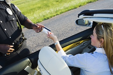 Kathie was warned by the police officer that the driver's bureau will revoke her license if she gets another speeding ticket. Kathie was warned by the police officer that the driver's bureau will revoke her license if she gets another speeding ticket.