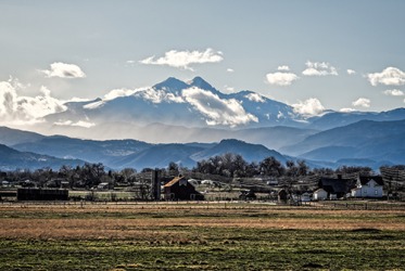 The city of Longmont in Colorado has spectacular views of the Longs Peak ridge line. The city of Longmont in Colorado has spectacular views of the Longs Peak ridge line.