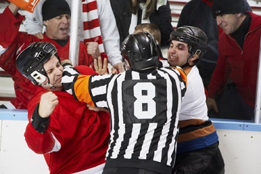 Rowdy fans are the norm at ice hockey games. Rowdy fans are the norm at ice hockey games.