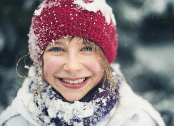 Lucy's cheeks get ruddy when she plays outside in the snow. Lucy's cheeks get ruddy when she plays outside in the snow.