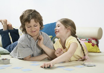 It really ruffles Brandon's feathers that his sister gloats when she beats him playing cards. It really ruffles Brandon's feathers that his sister gloats when she beats him playing cards.